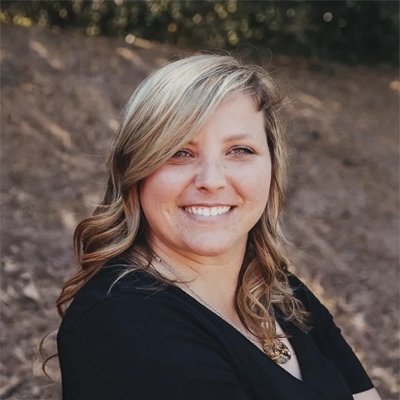 A headshot of Dr. Kayla Martin, a chiropractor at Cumming Chiropractic Center.